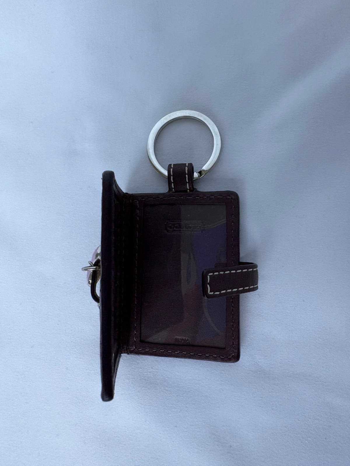 Coach monogram photo album keychain