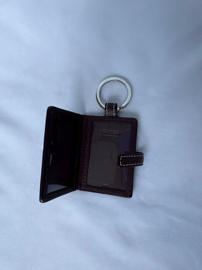 Coach monogram photo album keychain